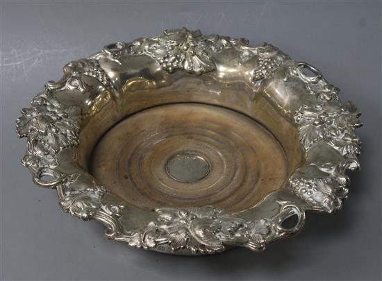 A Victorian silver wine coaster, by Henry Wilkinson & Co, 19.6cm.